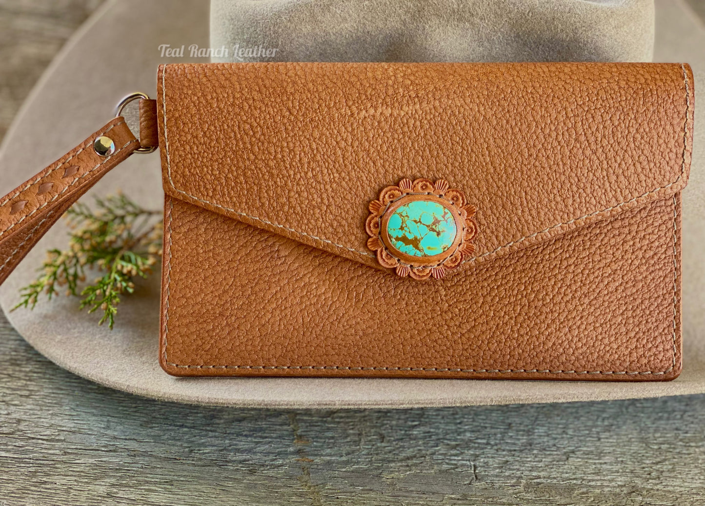 Turquoise and leather wristlet clutch