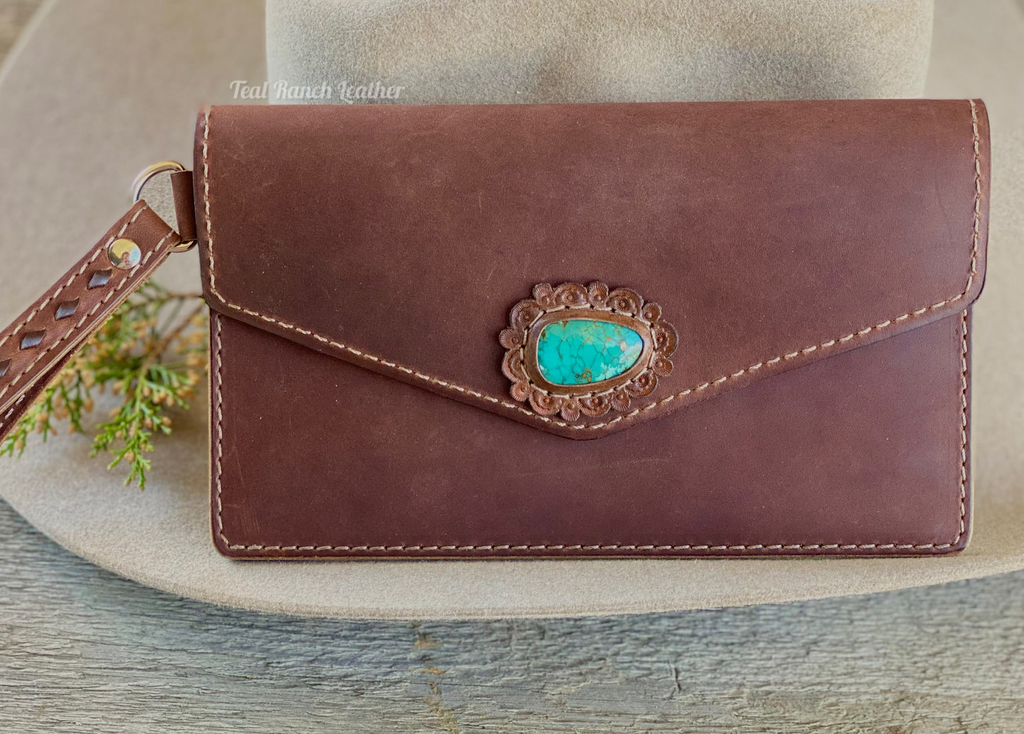 Turquoise and leather wristlet clutch