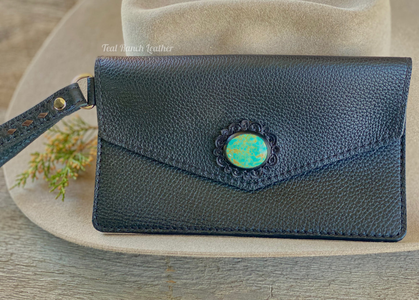 Turquoise and leather wristlet clutch