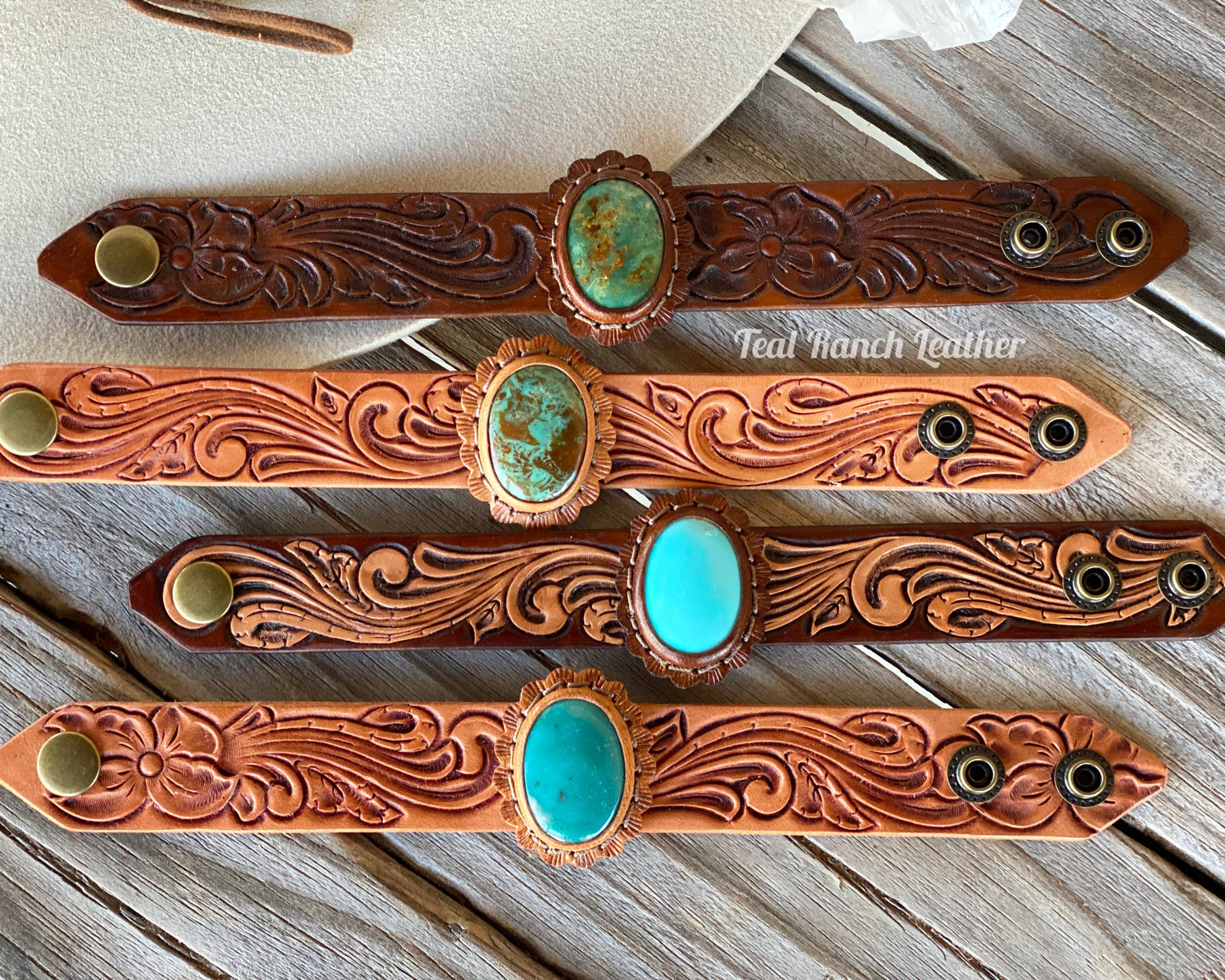 Tooled leather and turquoise cuffs