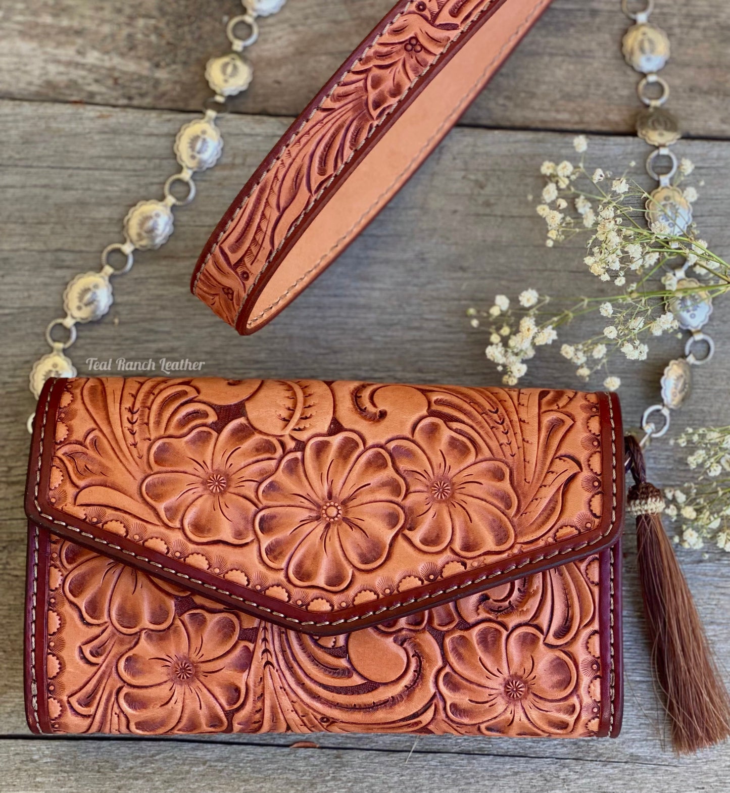 Small fully tooled leather cross body purse with concho chain