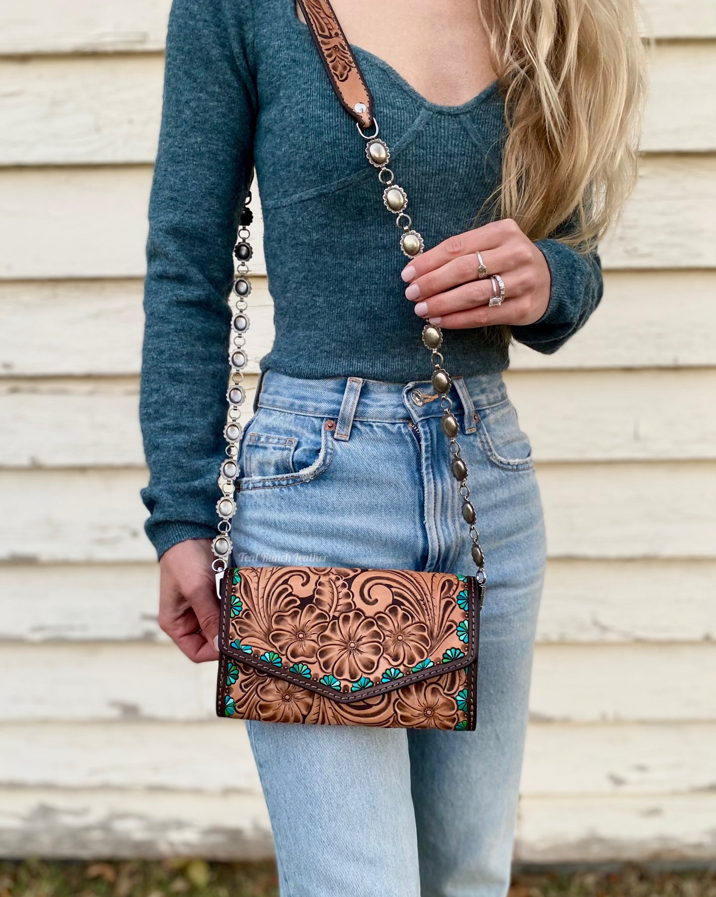 Small tooled cross body purse with concho chain and turquoise accents