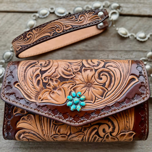 Small tooled leather cross body purse with CH designs turquoise