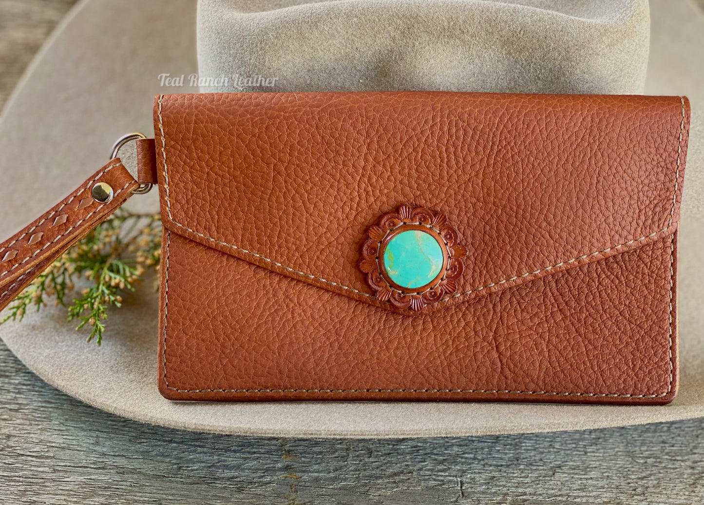 Turquoise and leather wristlet clutch