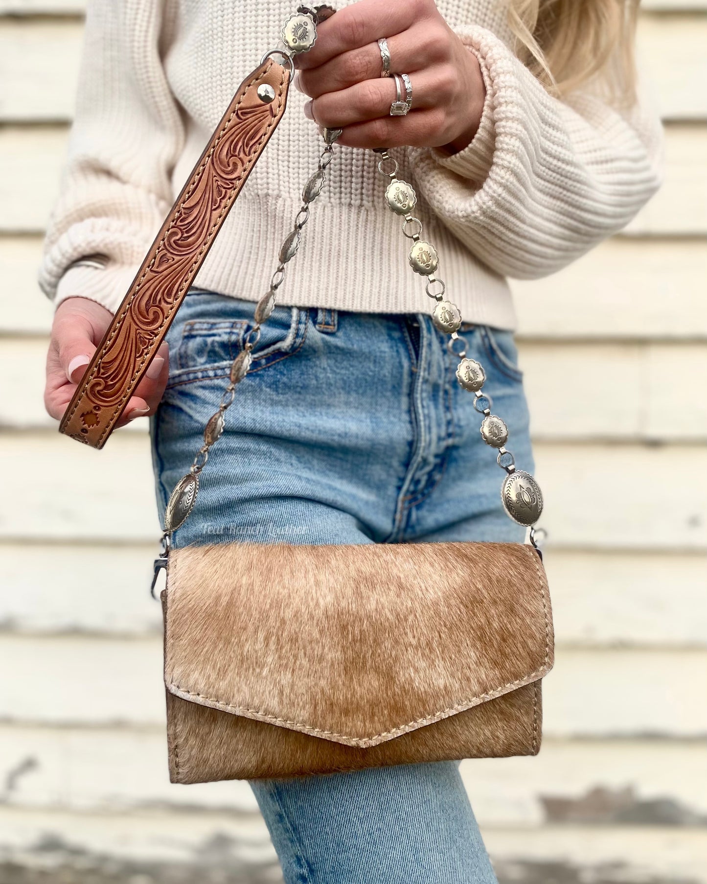 Small hair on hide cross body purse with tooled leather and concho chain- Light tan