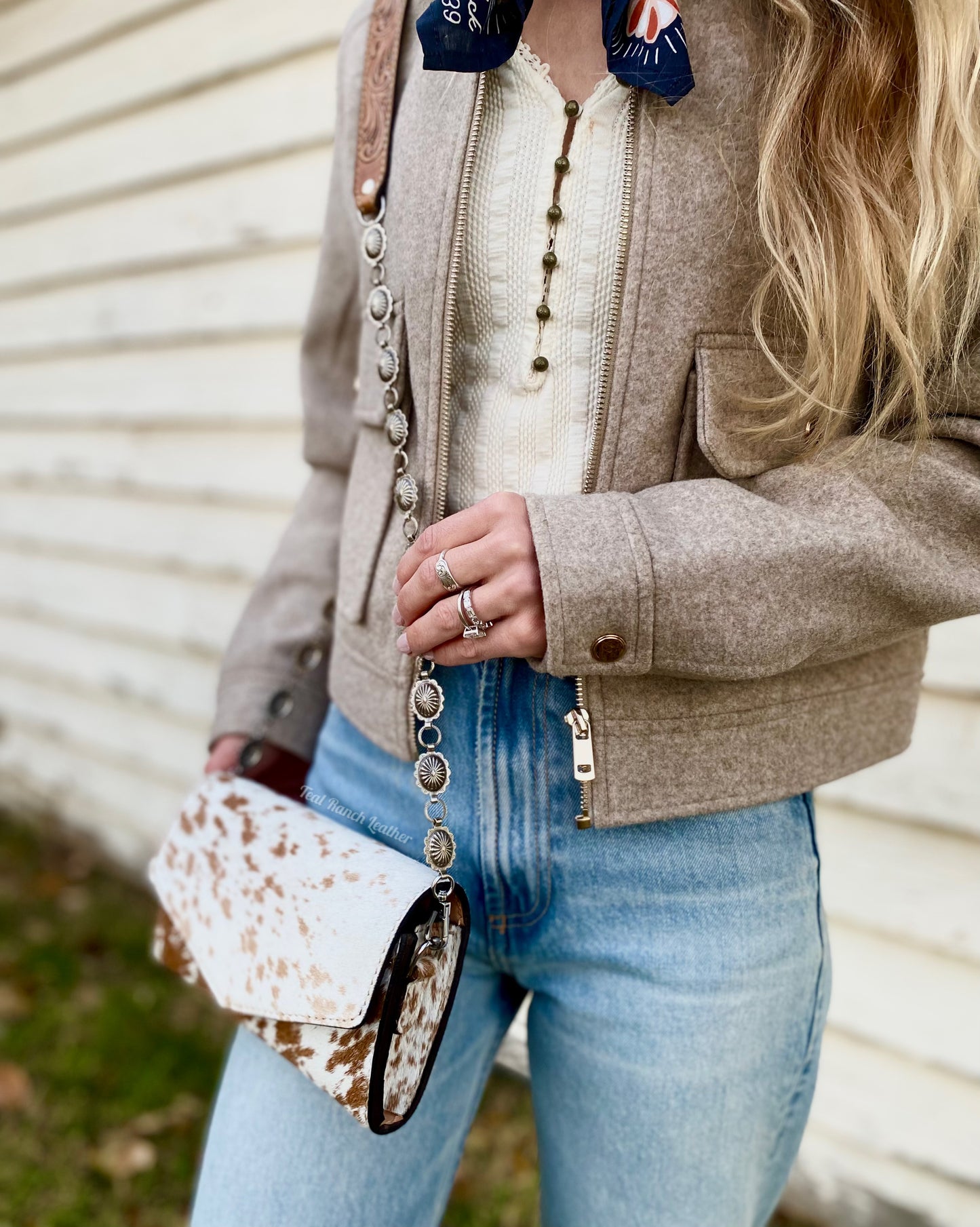 Small hair on hide cross body purse with tooled leather and concho chain-Light tan