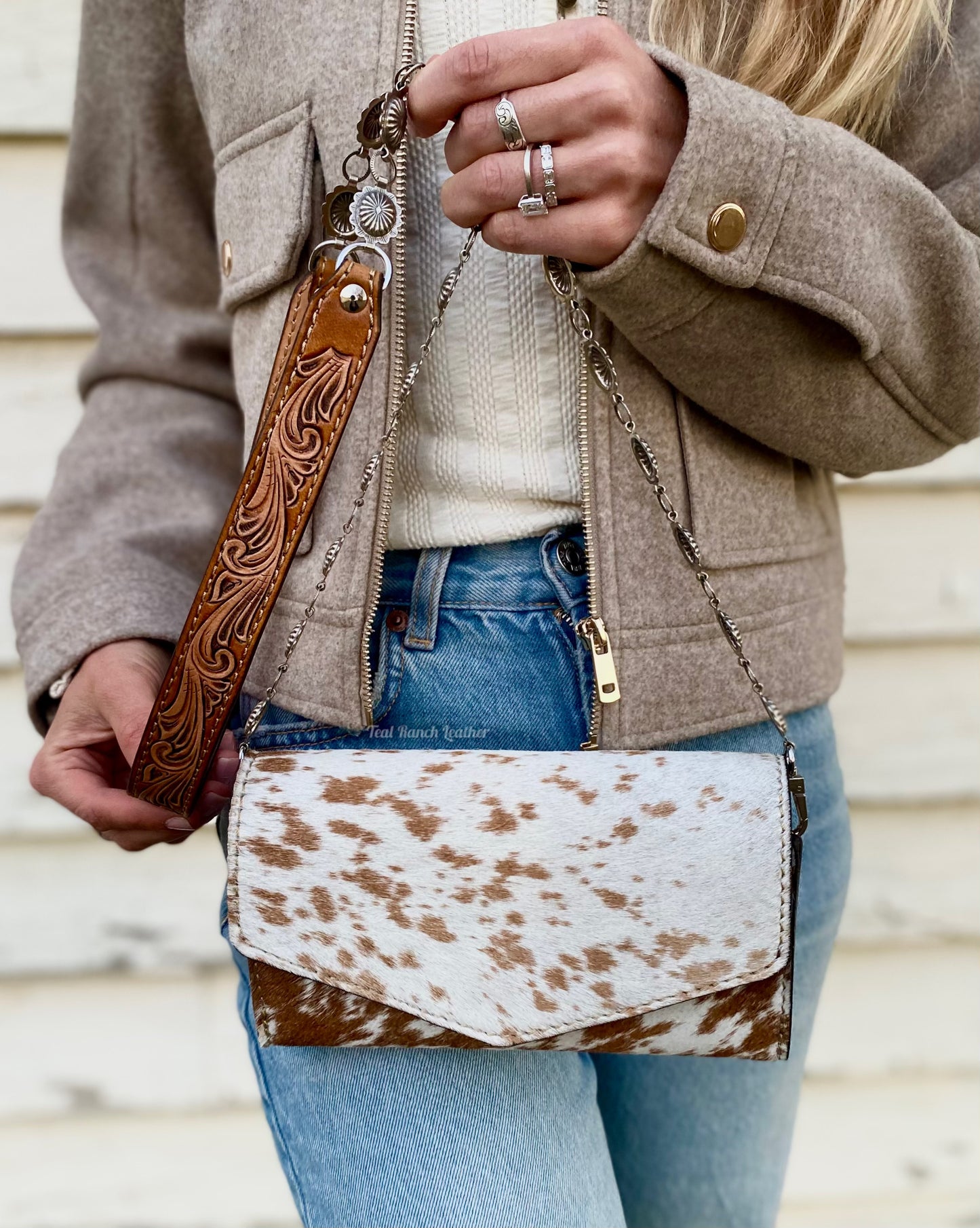 Small hair on hide cross body purse with tooled leather and concho chain-Light tan