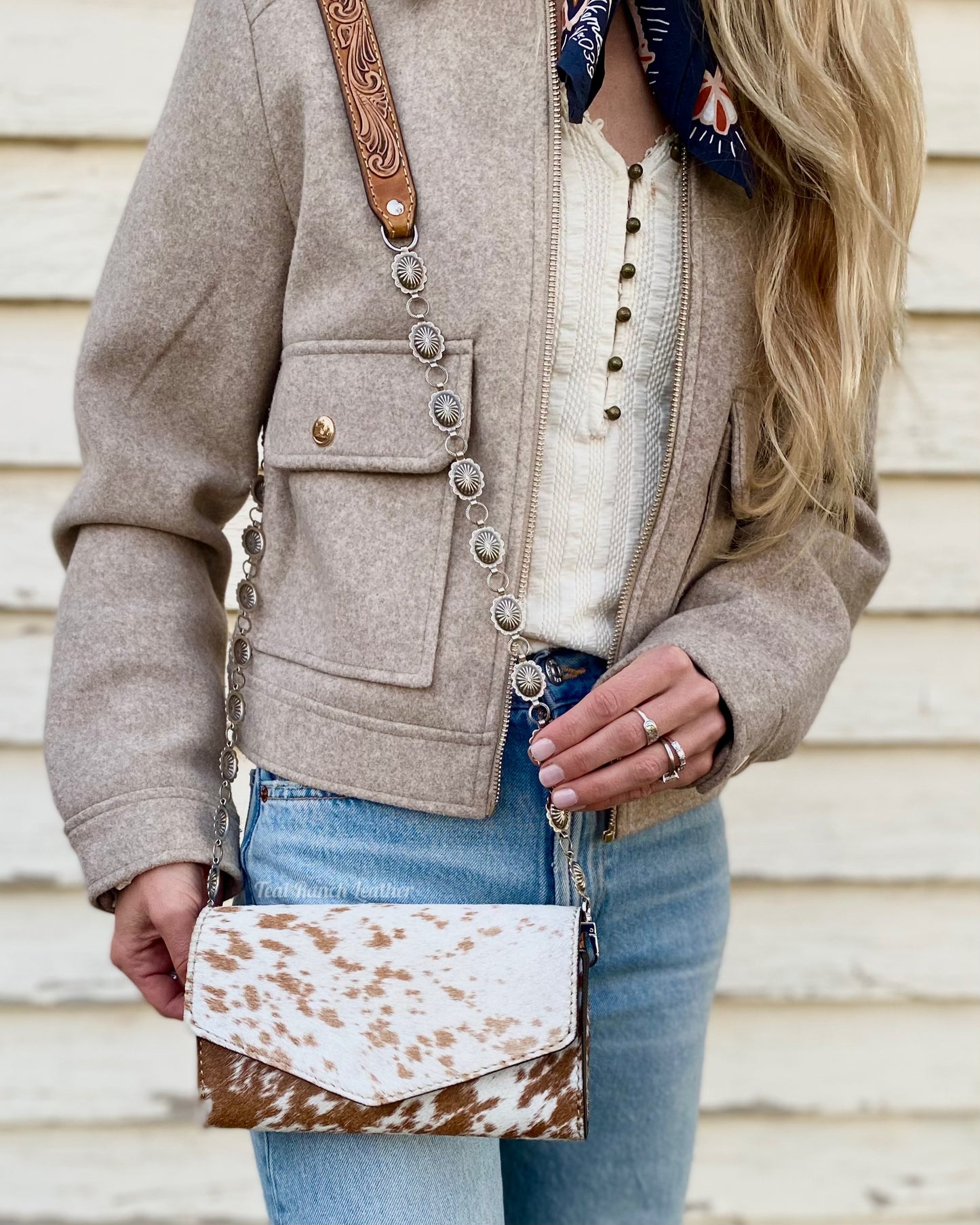 Small hair on hide cross body purse with tooled leather and concho chain-Light tan