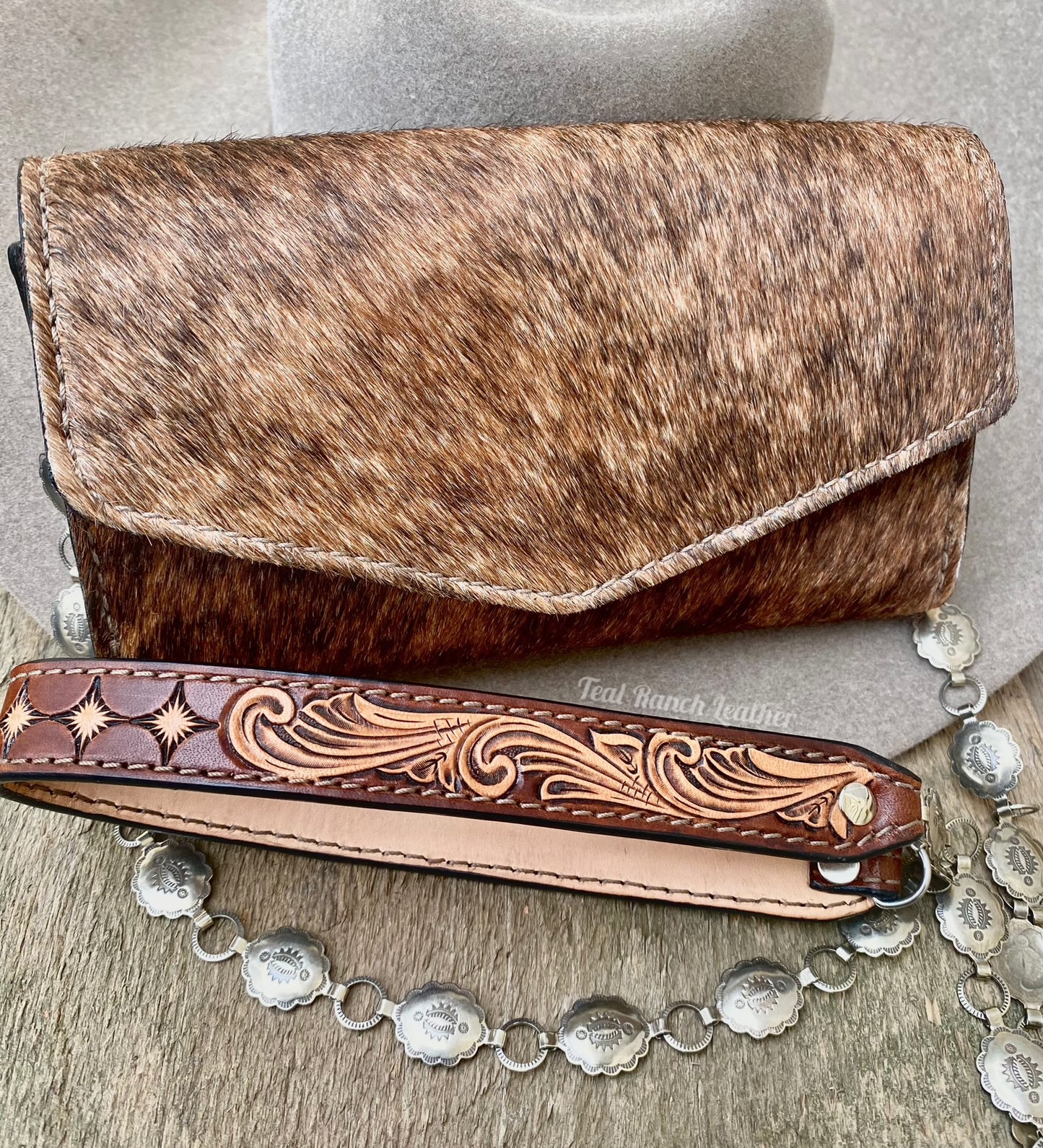 Small hair on hide cross body purse with tooled leather and concho chain- Brindle hide