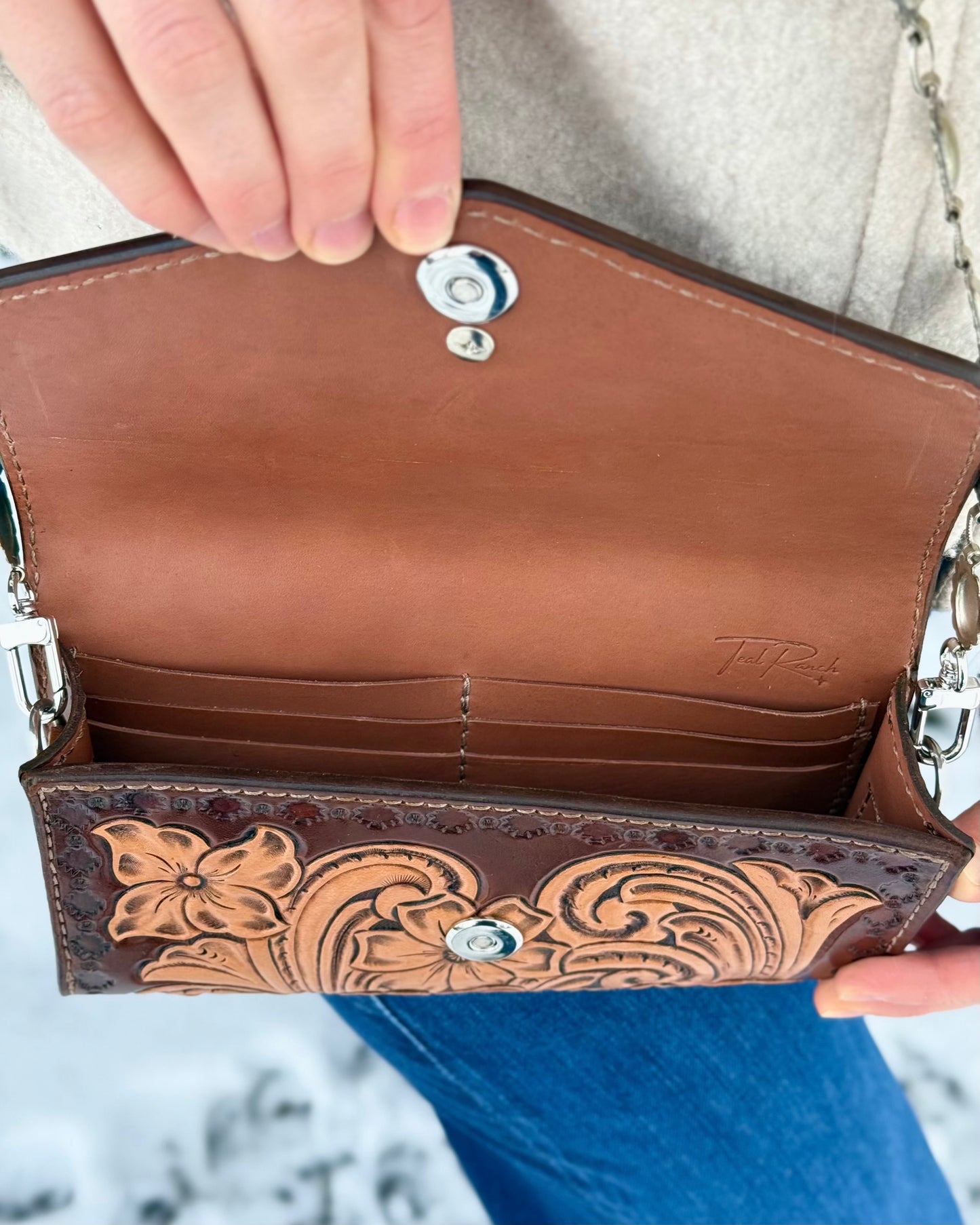 Small tooled leather cross body purse with CH designs turquoise