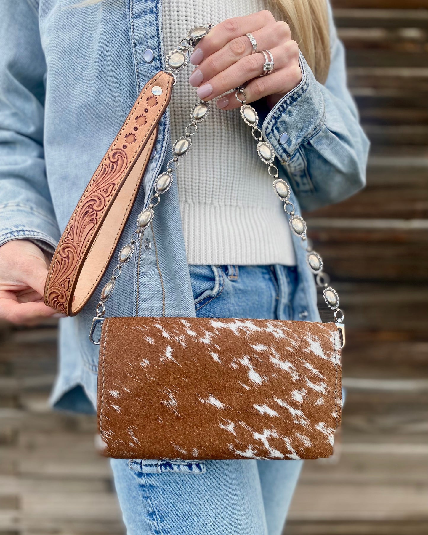 Small hair on hide cross body purse with tooled leather and concho chain- light longhorn