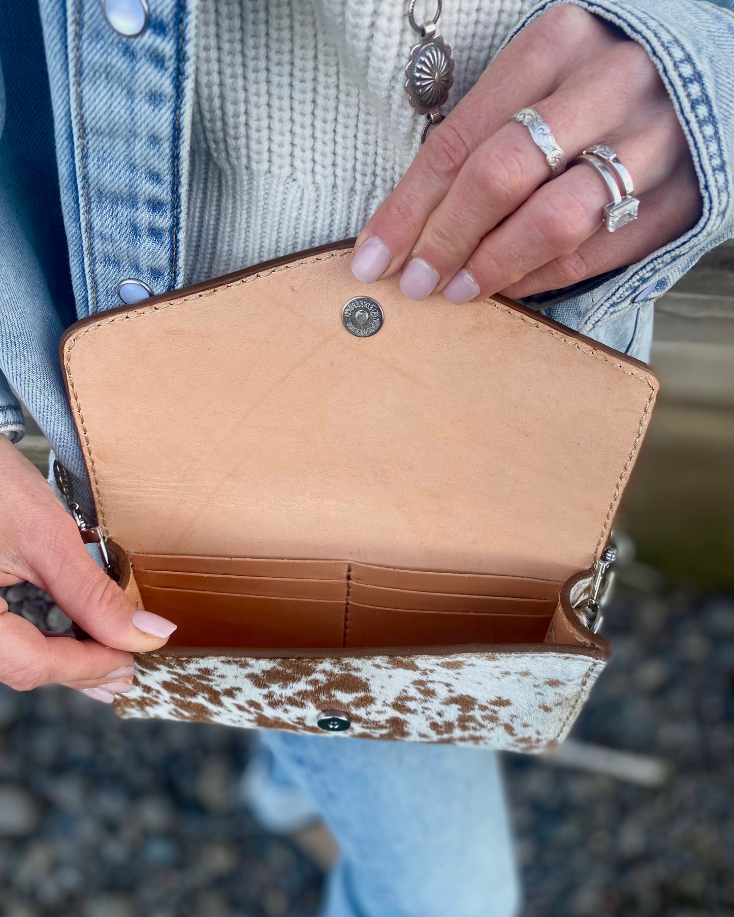 Small hair on hide cross body purse with tooled leather and concho chain- light longhorn