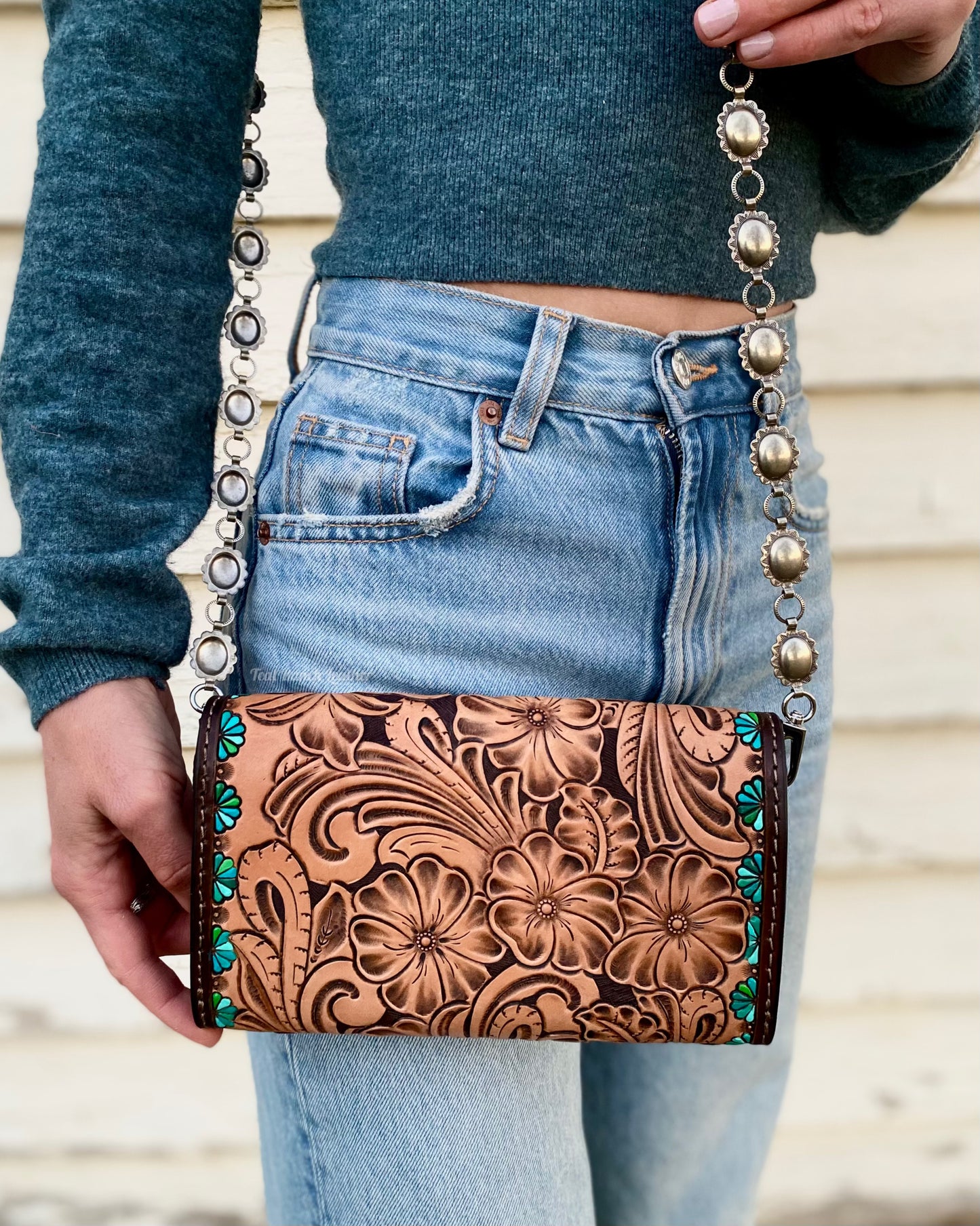 Small tooled cross body purse with concho chain and turquoise accents