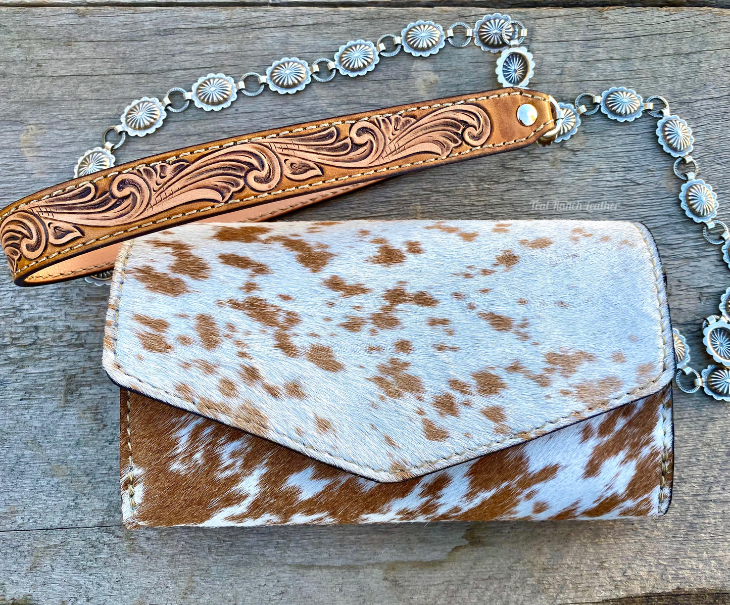 Small hair on hide cross body purse with tooled leather and concho chain-Light tan