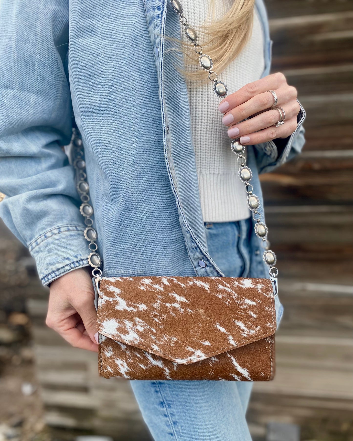 Small hair on hide cross body purse with tooled leather and concho chain- light longhorn