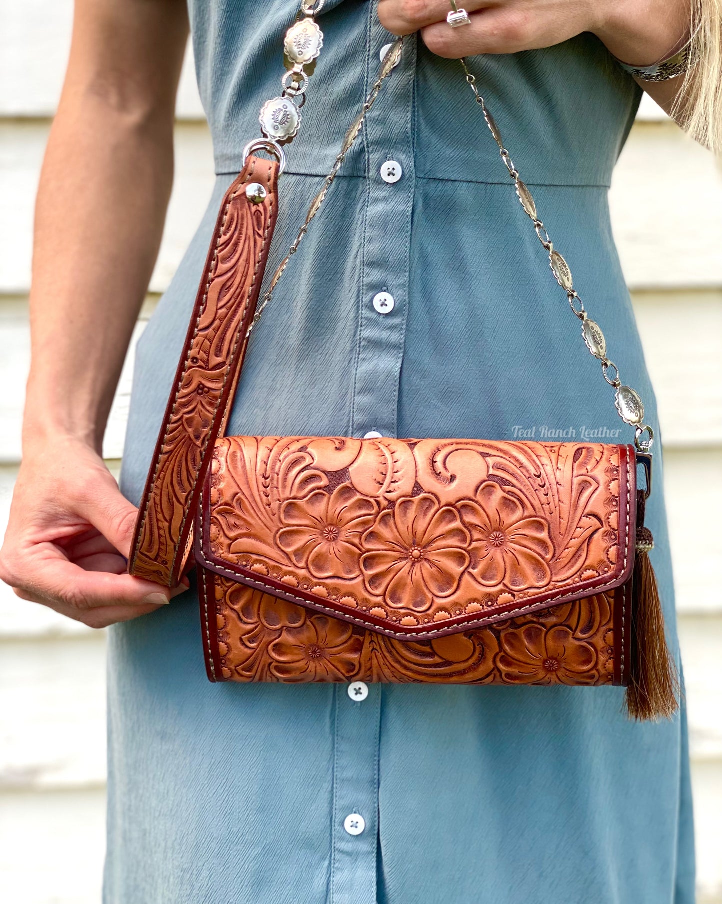 Small fully tooled leather cross body purse with concho chain