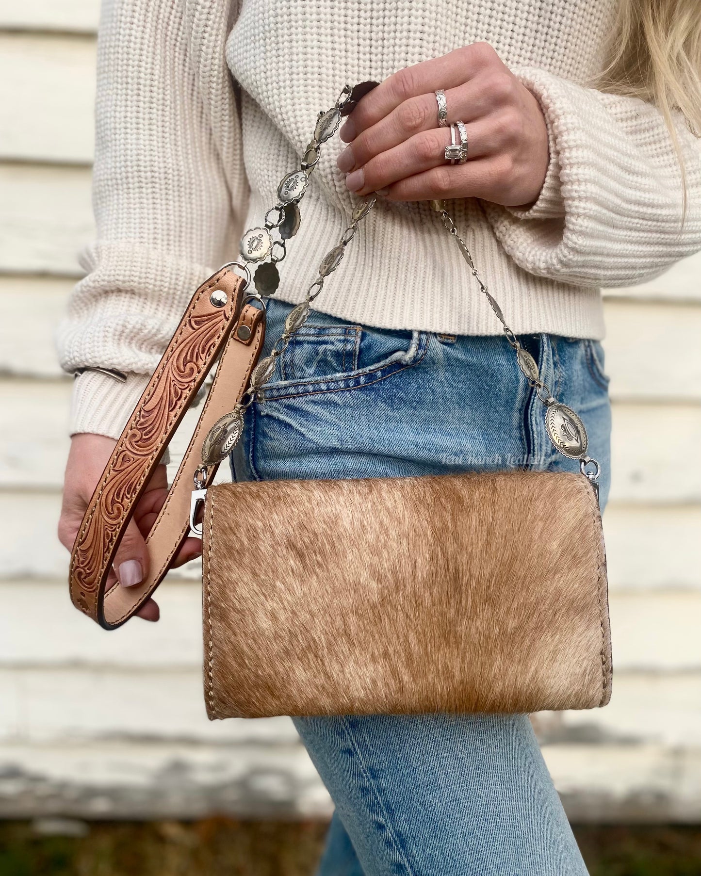 Small hair on hide cross body purse with tooled leather and concho chain- Light tan