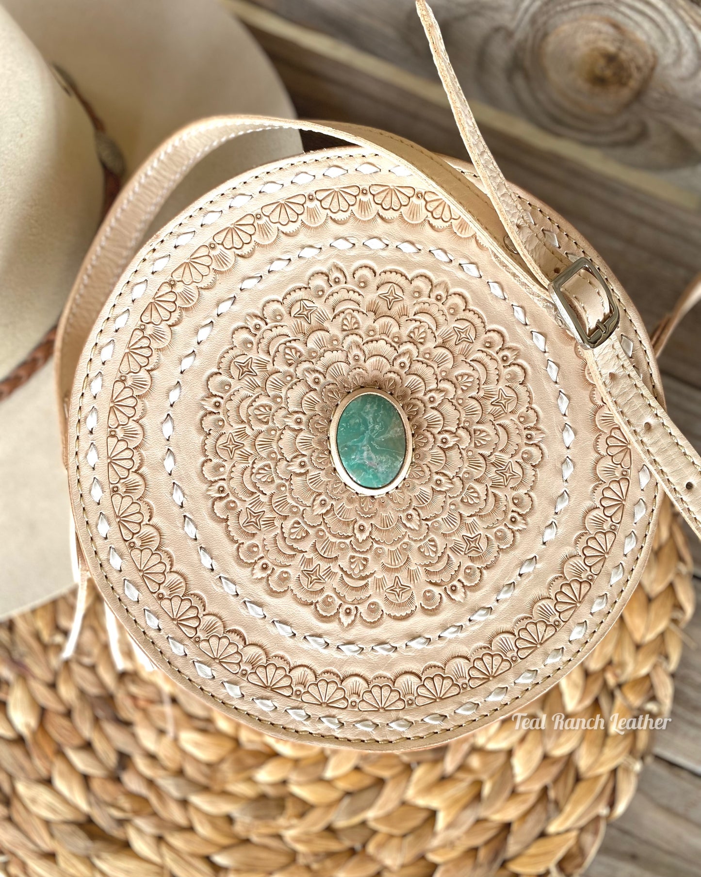 Light leather round purse with turquoise