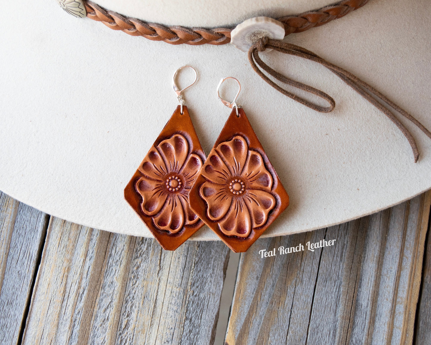 Tooled flower leather earrings