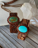 Tooled leather and turquoise cuffs